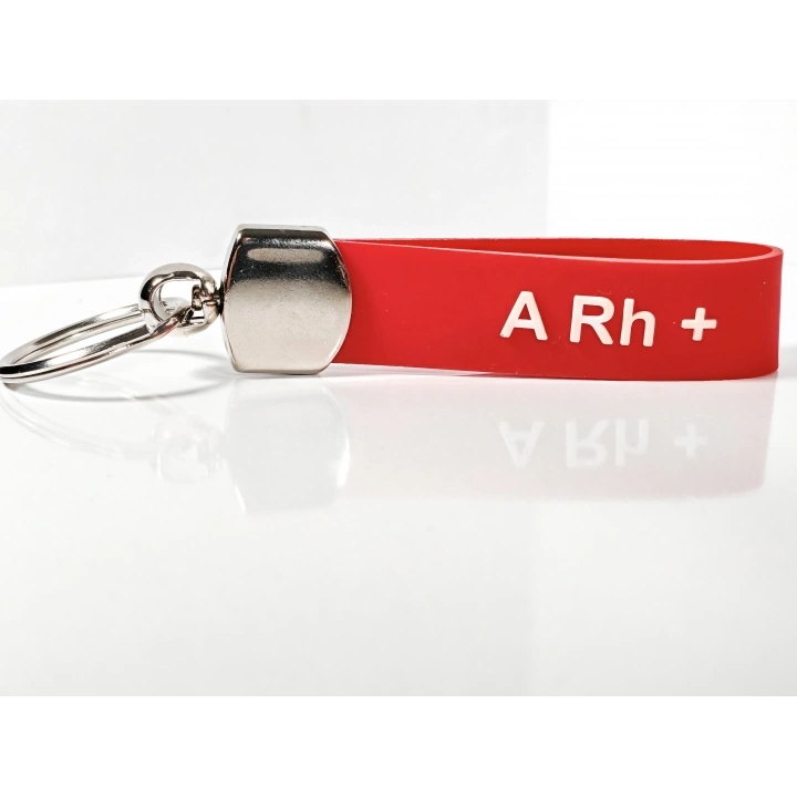 A Rh(+) Pozitif Kan Grubu Silikon Anahtarlık – Acil Durumlar İçin Hayati Bilgi