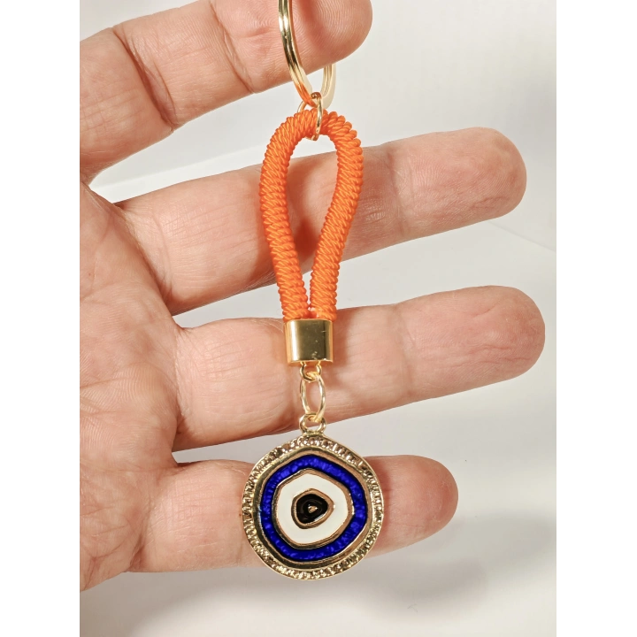 Turuncu İpli Nazar Boncuğu Detaylı Metal Anahtarlık – Şık, Anlamlı ve Dikkat Çekici Tasarım