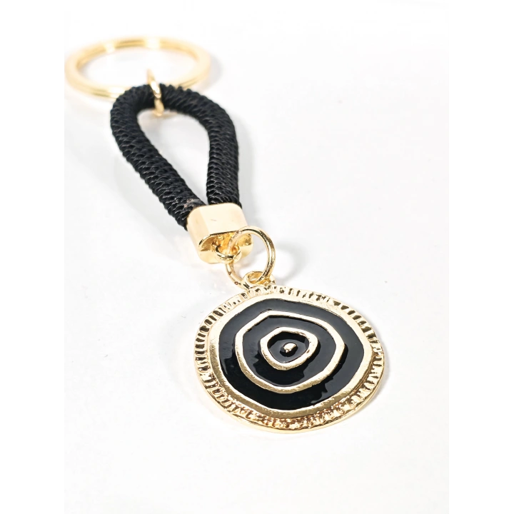 Siyah Örgü İpli Nazar Motifli Yuvarlak Metal Anahtarlık – Modern, Güçlü ve Şık Tasarım