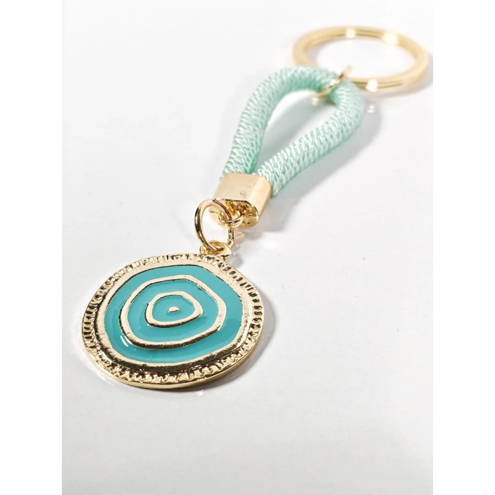 Mint Yeşili Örgü İpli Nazar Motifli Metal Anahtarlık – Zarif, Ferah ve Anlamlı Tasarım
