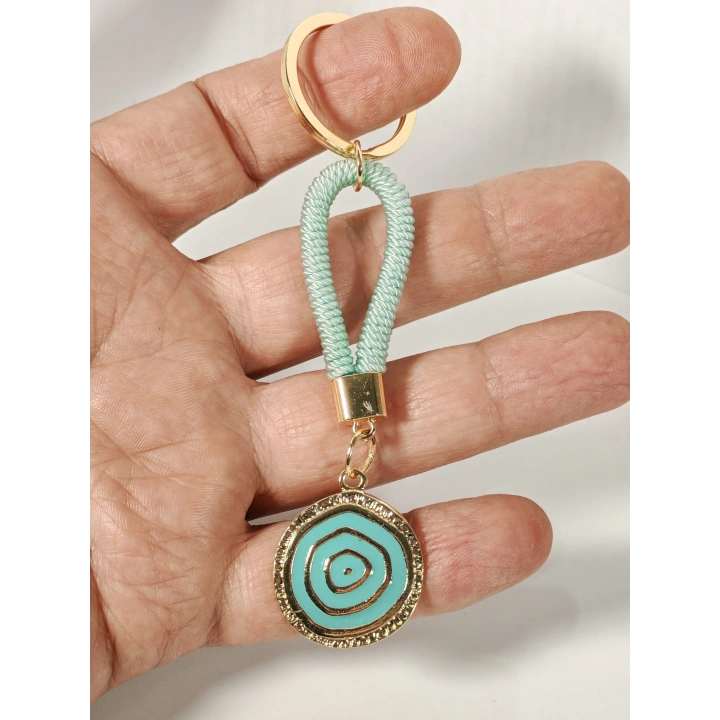 Mint Yeşili Örgü İpli Nazar Motifli Metal Anahtarlık – Zarif, Ferah ve Anlamlı Tasarım