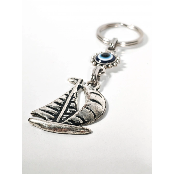 Yelkenli & Nazar Boncuğu Figürlü Anahtarlık – Koruma, Özgürlük ve Yolculuk Sembolü