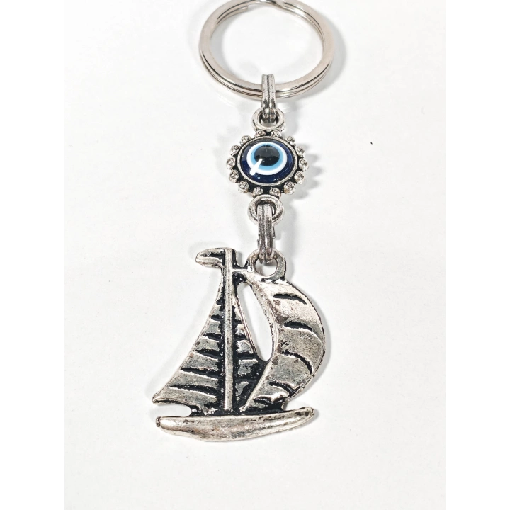 Yelkenli & Nazar Boncuğu Figürlü Anahtarlık – Koruma, Özgürlük ve Yolculuk Sembolü