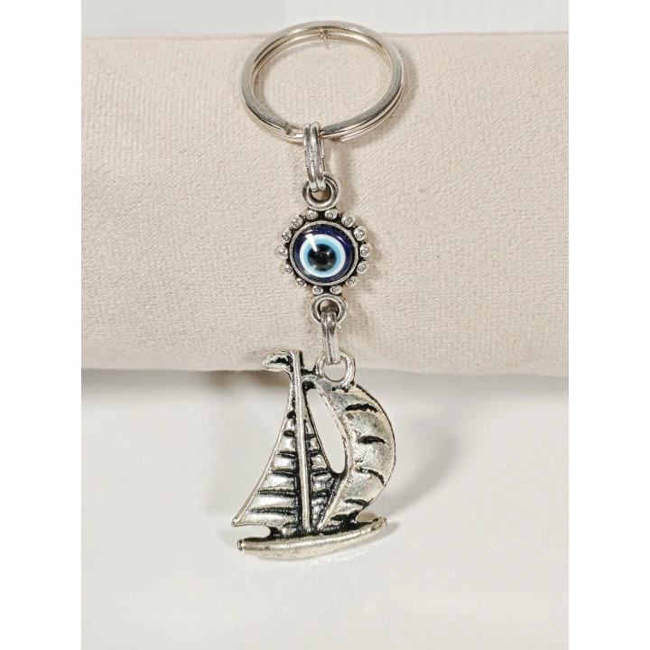 Yelkenli & Nazar Boncuğu Figürlü Anahtarlık – Koruma, Özgürlük ve Yolculuk Sembolü