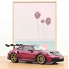 Norev 1087370 1/18 Porsche 911 GT3 RS, Weissach Pack 2022 Ruby Star