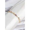Pirinç Gold Renk Pembe ve Mor Zirkon Taşlı Çiçek Model Kadın Bileklik