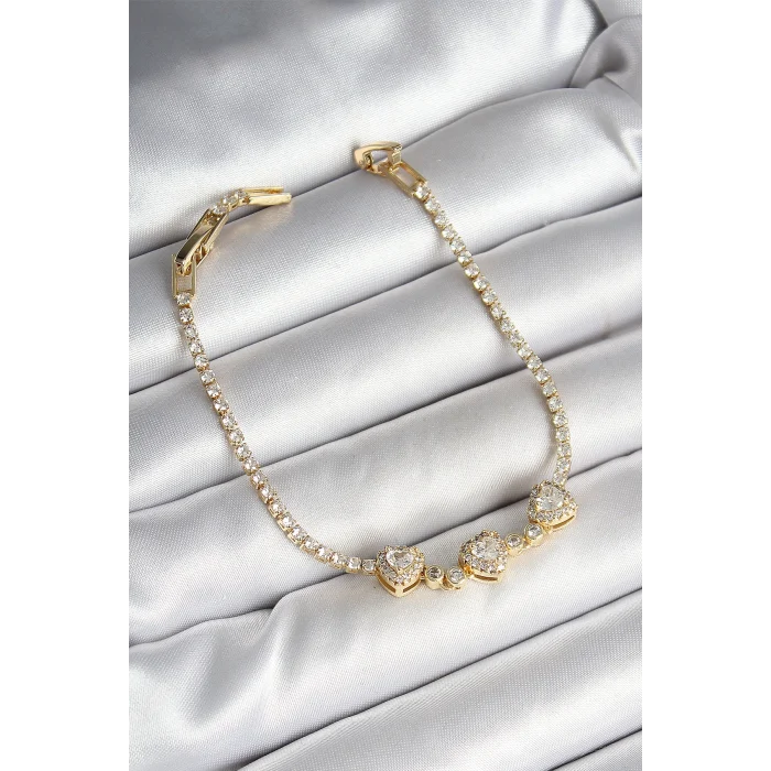 Pirinç Sıralı Kalp Figürlü Zirkon Taşlı Gold Renk Kadın Bileklik