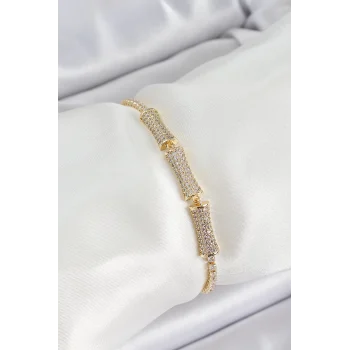 Pirinç Gold Renk Zirkon Taşlı Kemik Model Kadın Bileklik