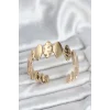 Pirinç Gold Renk Parçalı Model Kadın Bileklik