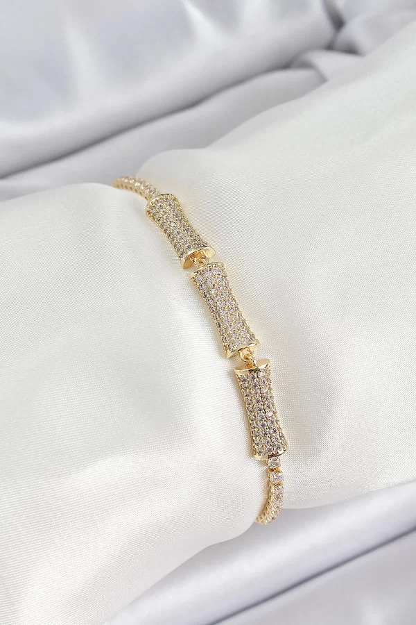 Pirinç Gold Renk Zirkon Taşlı Kemik Model Kadın Bileklik
