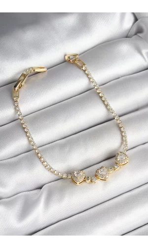 Pirinç Sıralı Kalp Figürlü Zirkon Taşlı Gold Renk Kadın Bileklik