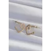 Pirinç Gold Renk Zirkon Taşlı Kıvrımlı Yarım Kalp Küpe