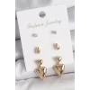 Pirinç Gold Renk Zirkon Taşlı Sallantılı Kalp Model 3 Çift Kadın Küpe Seti