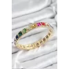 Pirinç Karışık Zirkon Taşlı Kare Model Gold Renk Lastikli Kadın Bileklik