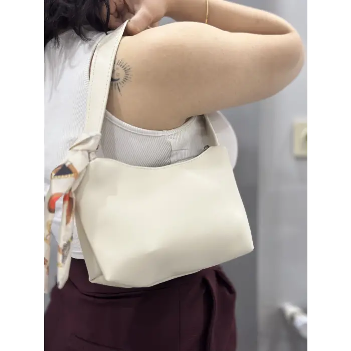 Riwan krem cilt çanta