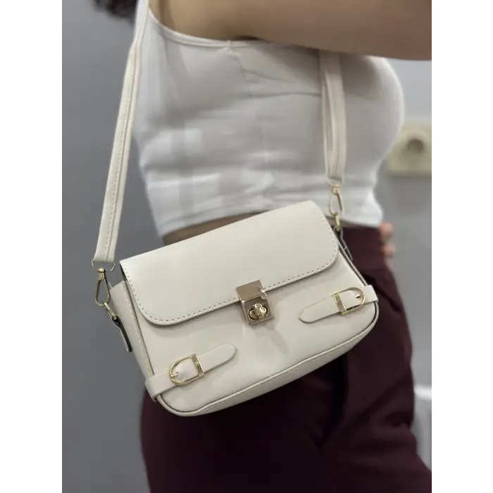 Zerej kemerli krem cilt çanta