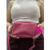 Ponpon fuşya cilt çanta