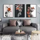 Floral Sanatın Büyüsü: Üçlü Metal Çerçeveli Tablo Takımı