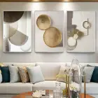 Geometrik Şıklık: Modern Formların Altın ve Bej Tonlarında Buluşması Gümüş Çerçeveli Tablo Seti