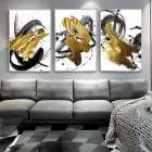 Dinamik Kontrast: Altın Fırça Darbeleri Ile Soyut Üçlü Metal Çerçeveli Tablo Seti