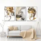 Sanatsal Karşıtlıklar: Altın Yansımalar Ve Siyahın Gücü Metal Çerçeveli Tablo Takımı