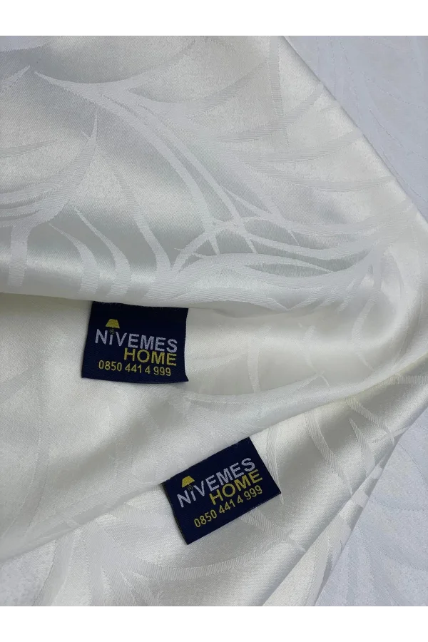 TOVAGLIA ANTIMACCHIA CON FANTASIA FOGLIE CREMA 140X200 NIVEMESHOME