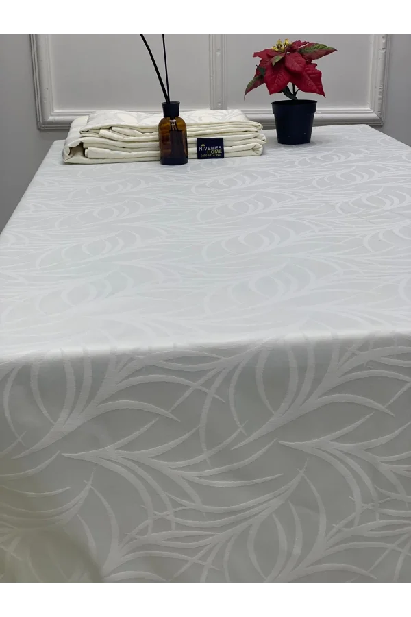 TOVAGLIA ANTIMACCHIA CON FANTASIA FOGLIE CREMA 140X200 NIVEMESHOME