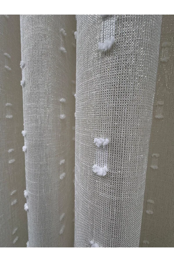 NİVEMESHOME FLORIDA LEINENOPTIK CHAMPAGNERFARBENER BOHÈME-STIL POMPOM 1/3 DICKFALTIGER TÜLLVORHANG APM