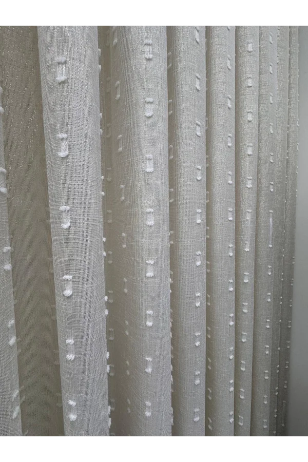 NİVEMESHOME FLORIDA LEINENOPTIK CHAMPAGNERFARBENER BOHÈME-STIL POMPOM 1/3 DICKFALTIGER TÜLLVORHANG APM