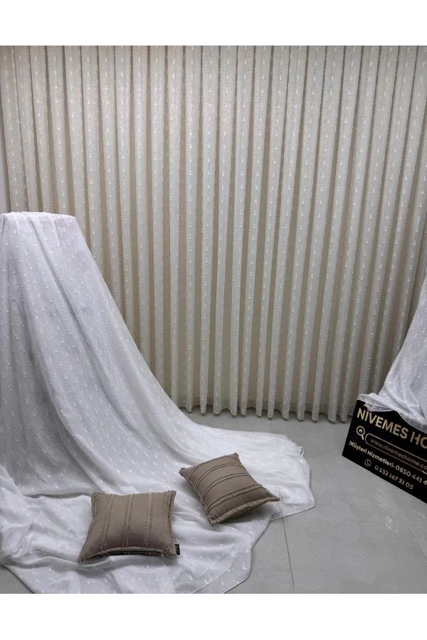 NİVEMESHOME FLORIDA LEINENOPTIK CHAMPAGNERFARBENER BOHÈME-STIL POMPOM 1/3 DICKFALTIGER TÜLLVORHANG APM