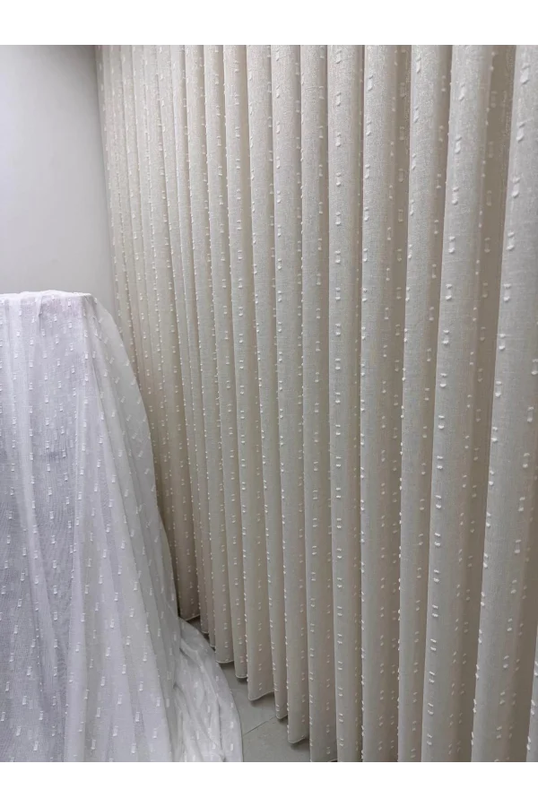 NİVEMESHOME FLORIDA LEINENOPTIK CHAMPAGNERFARBENER BOHÈME-STIL POMPOM 1/3 DICKFALTIGER TÜLLVORHANG APM