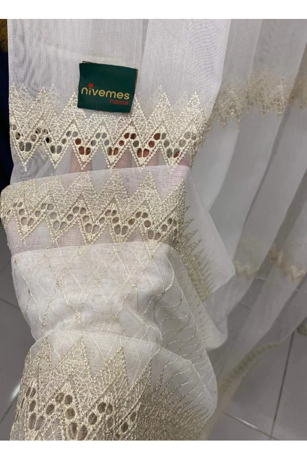 NİVEMESHOME SESİLYA ZİGZAG İŞLEMELİ GOLD 1/3 SIK PİLE TÜL PERDE APM