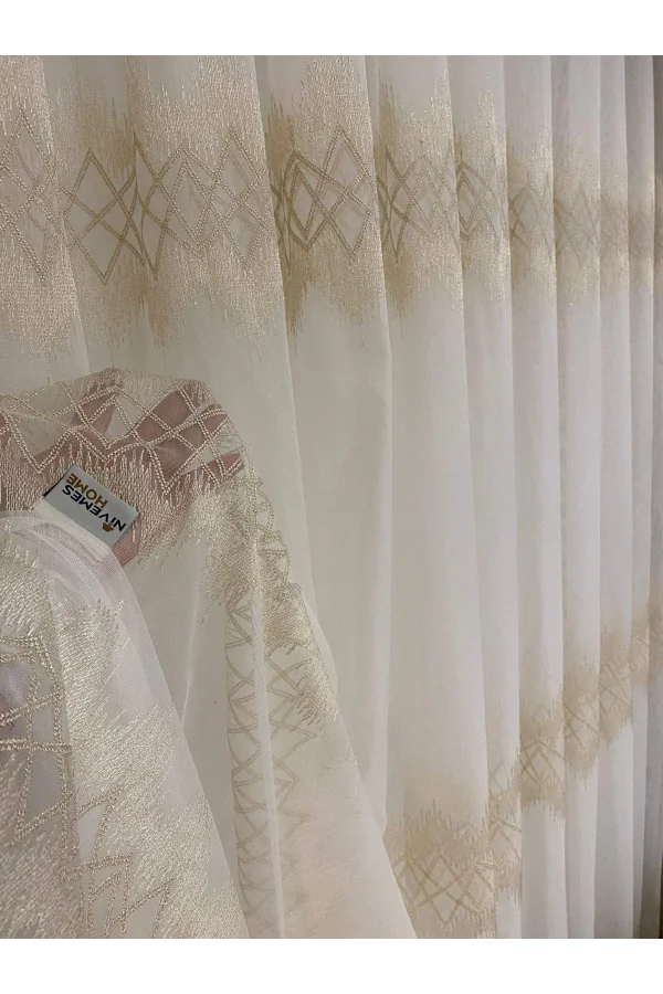 NİVEMESHOME TİTANUM NAKIŞLI KREM 1/3 SIK PİLE TÜL PERDE APM