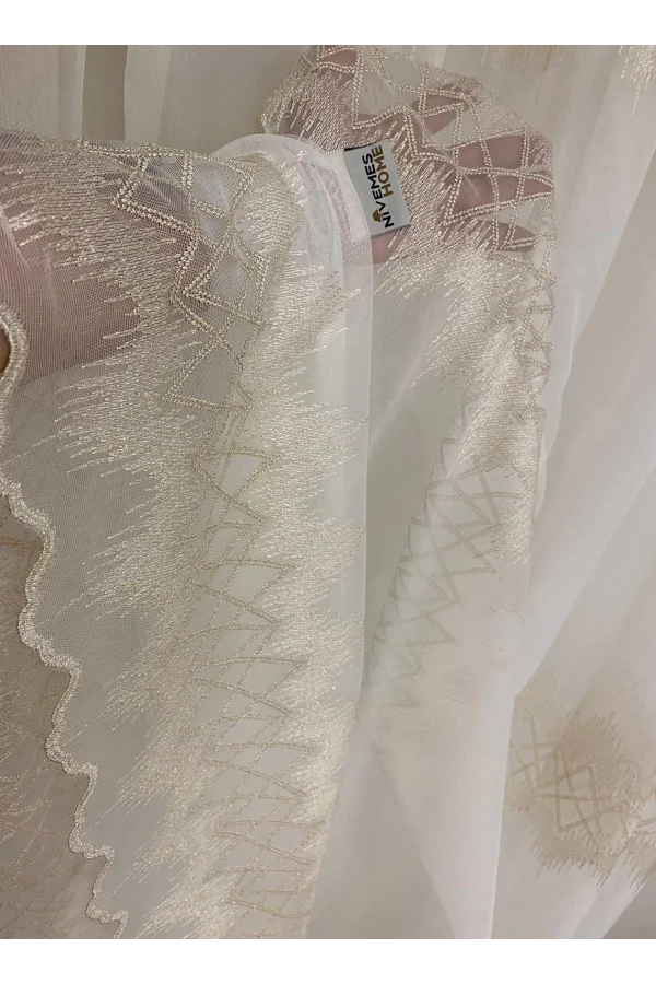 NİVEMESHOME TİTANUM NAKIŞLI KREM 1/3 SIK PİLE TÜL PERDE APM