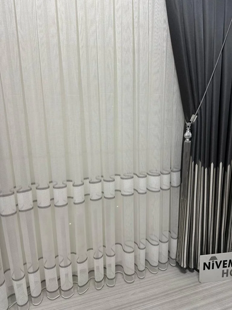 NİVEMESHOME MODERN ZIRH GÖRÜNÜMLÜ EKRU 1/3 SIK PİLELİ TÜL PERDE APM