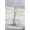 Pirinç Gold Renk Yonca Model Sıralı Zirkon Taşlı Kadın Bileklik
