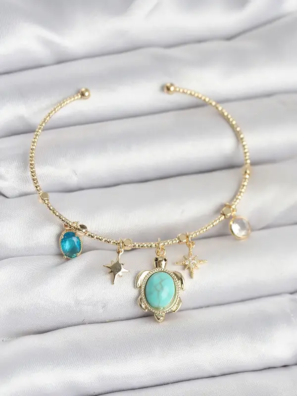 Caretta Caretta Charmlı Gold Renk Kadın Bileklik