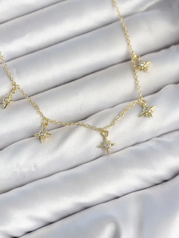 Pirinç Gold Renk Sıralı Minimal Kutup Yıldızı Model Kadın Kolye