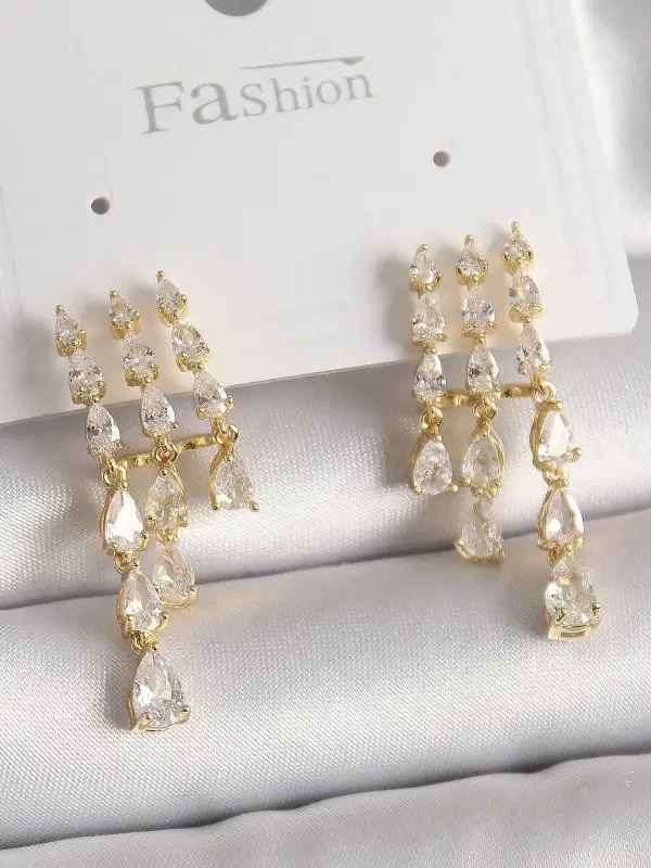 Pirinç Gold Renk Zirkon Taşlı Yağmur Model Kadın Küpe