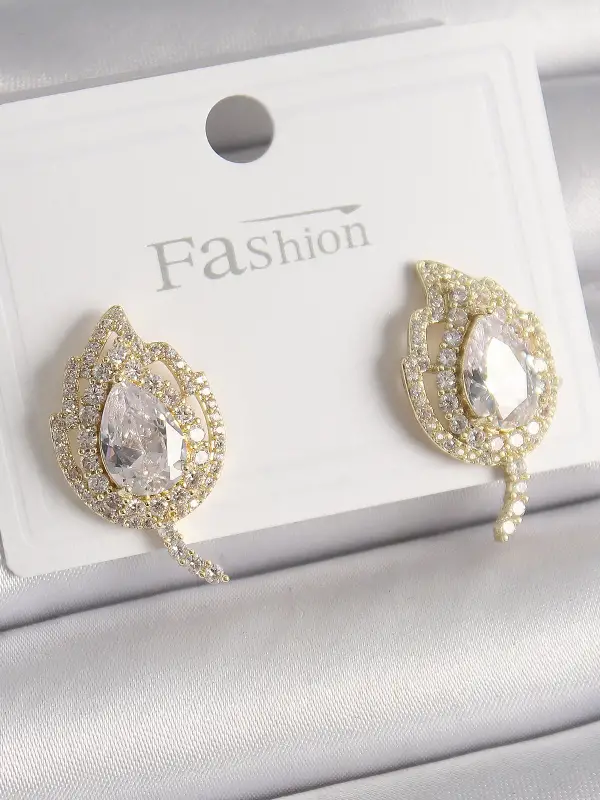 Pirinç Gold Renk Zirkon Taşlı Yaprak Model Kadın Küpe