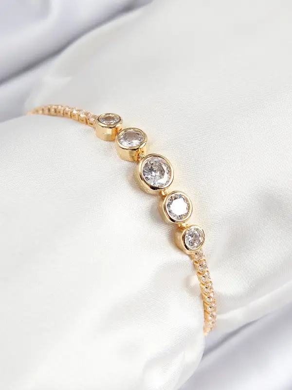 Pirinç Zirkon Taşlı Sıralı Daire Model Gold Renk Asansörlü Kadın Bileklik
