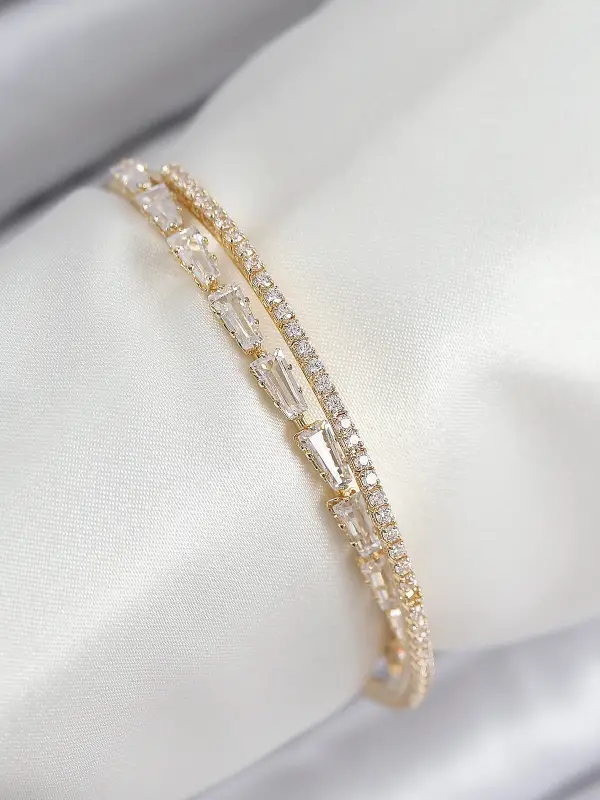 Pirinç Zirkon Taşlı Su Yolu Model Gold Renk Kadın Bileklik