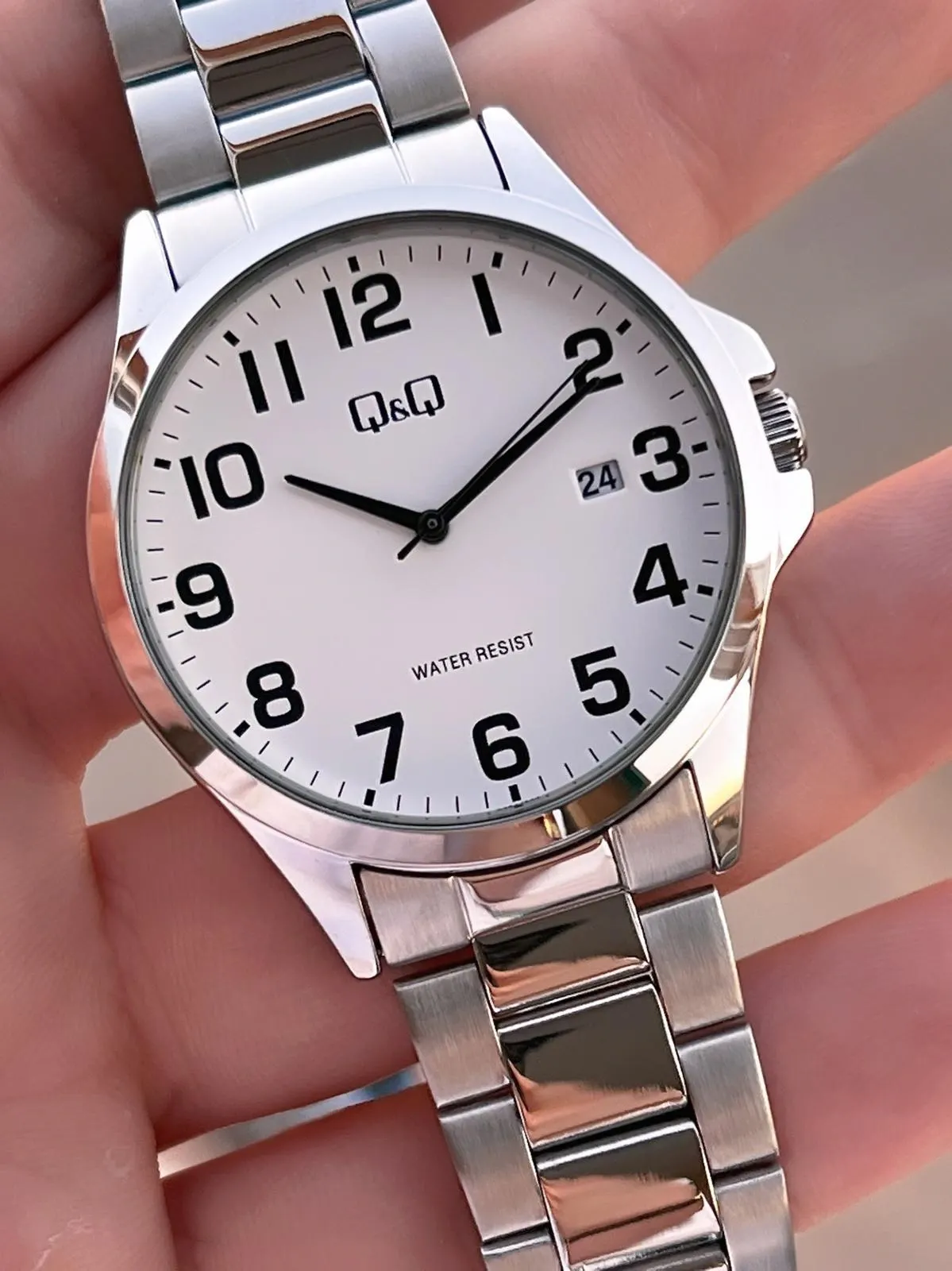 Q&Q Çelik Kordon Takvimli Kadran 2 Yıl Garantili 3 Atm Suya Dayanıklı Erkek Kol Saati QQ.E2004.A1