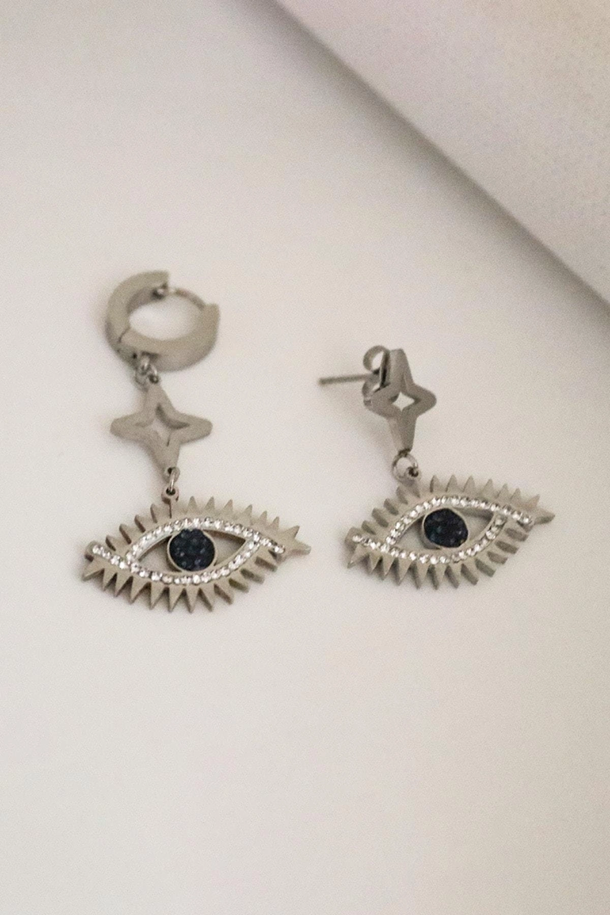 Göz Tasarımlı Zirkon Taşlı Gold ve Gümüş Kaplamalı Çelik Sallantılı ve Vidalı Küpe