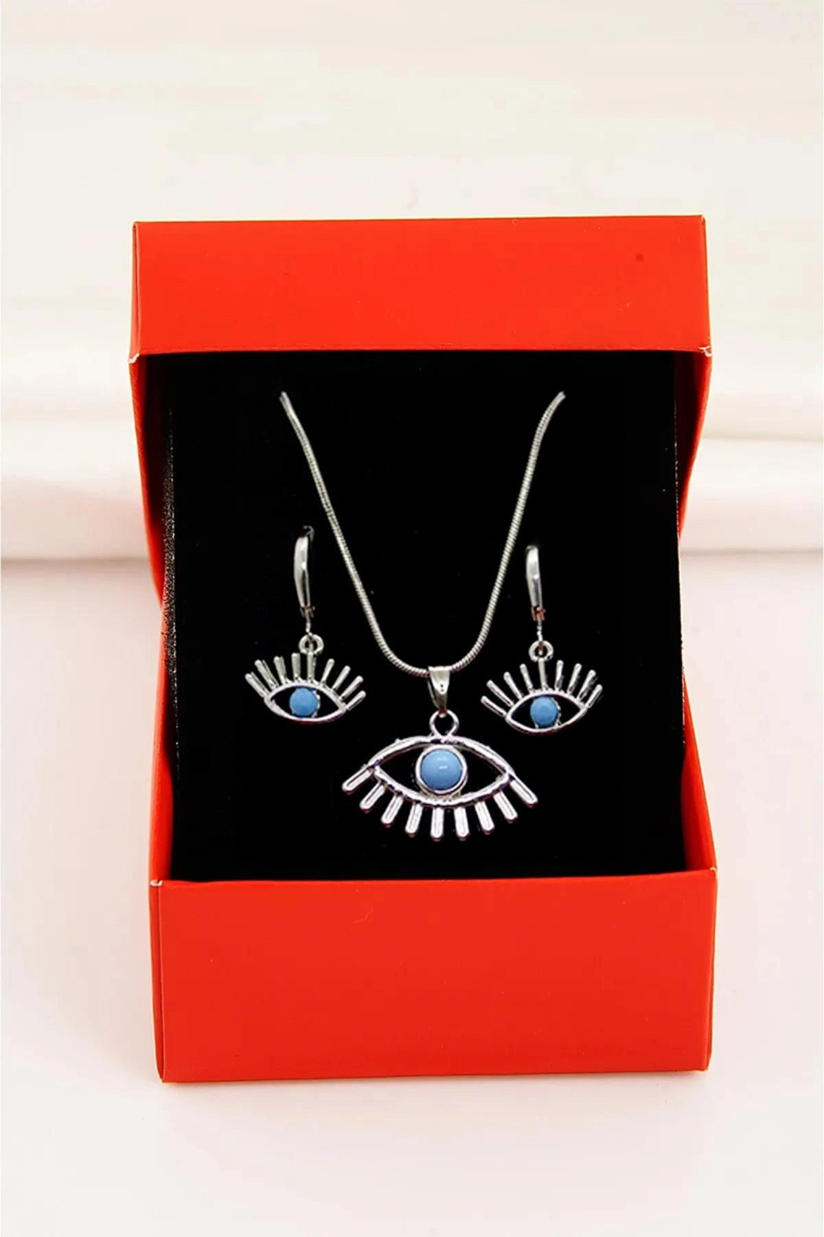 Göz Tasarımlı Gümüş Renkli Kolye Küpe Takımı