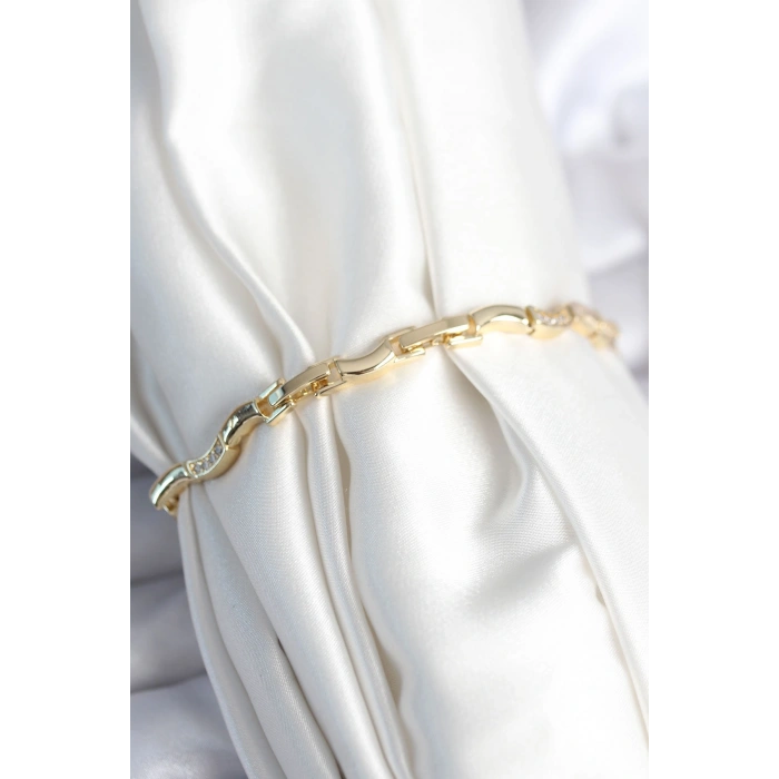 HarmonyAura Pirinç Gold Renk Dalgalı Model Kadın Bileklik