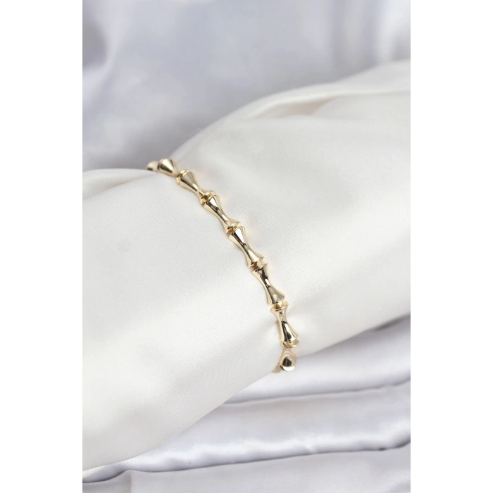 HarmonyAura Pirinç Gold Renk VIP Seri Kemik Model Zirkon Taşlı Kadın Bileklik