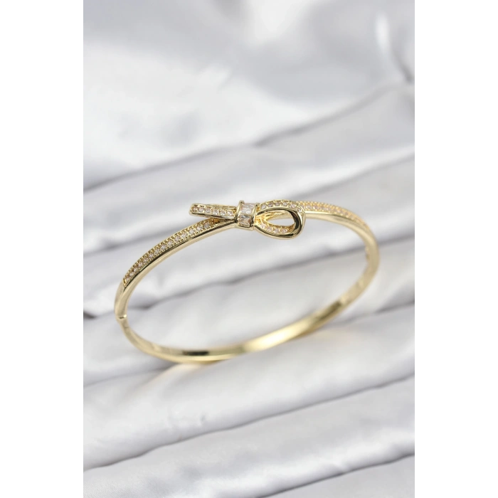 HarmonyAura Pirinç Gold Renk Zirkon Taşlı Fiyonk Model Kadın Kelepçe Bileklik