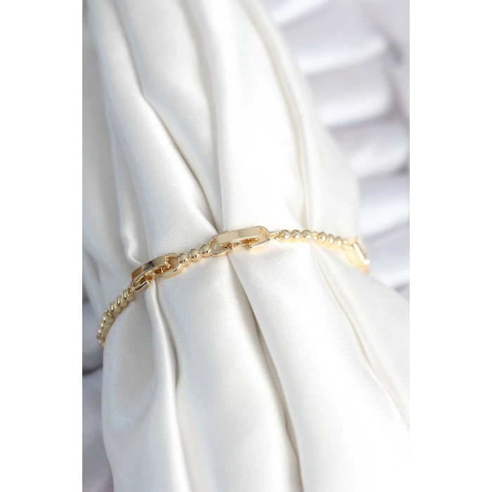 HarmonyAura Pirinç Gold Renk Zirkon Taşlı Kalpli Model Kadın Bileklik