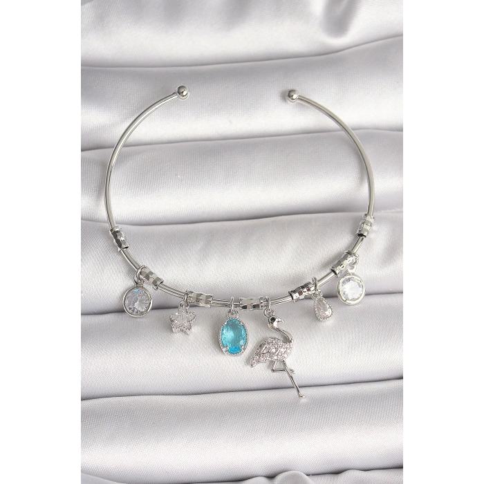 HarmonyAura Pirinç Gümüş Renk Sallantı Zirkon Taşlı Filaminga Figür Charm Kadın Bileklik